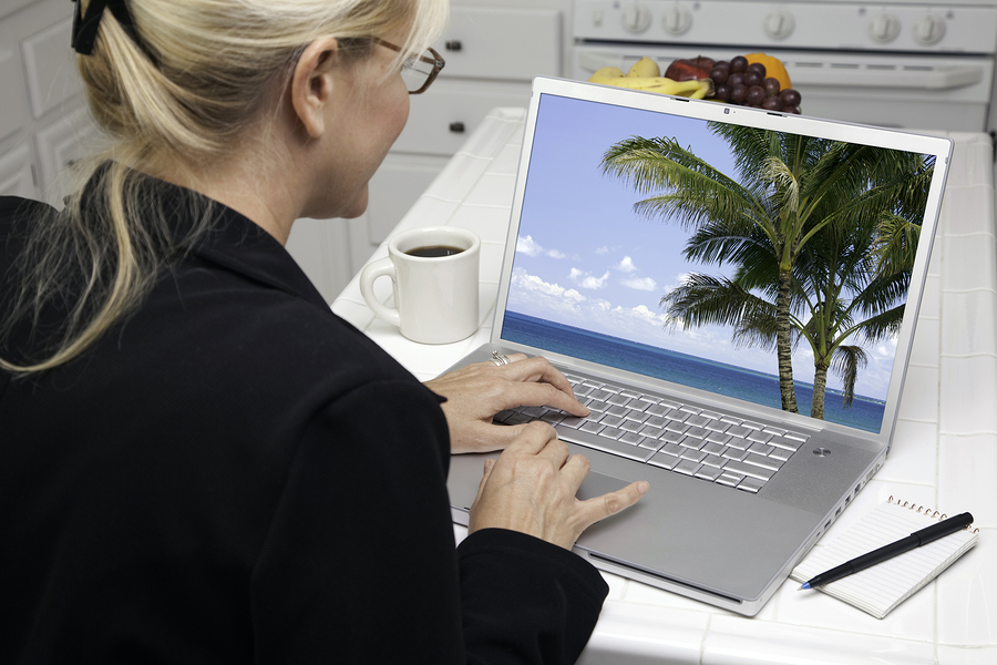 Woman booking a Hawaii vacation